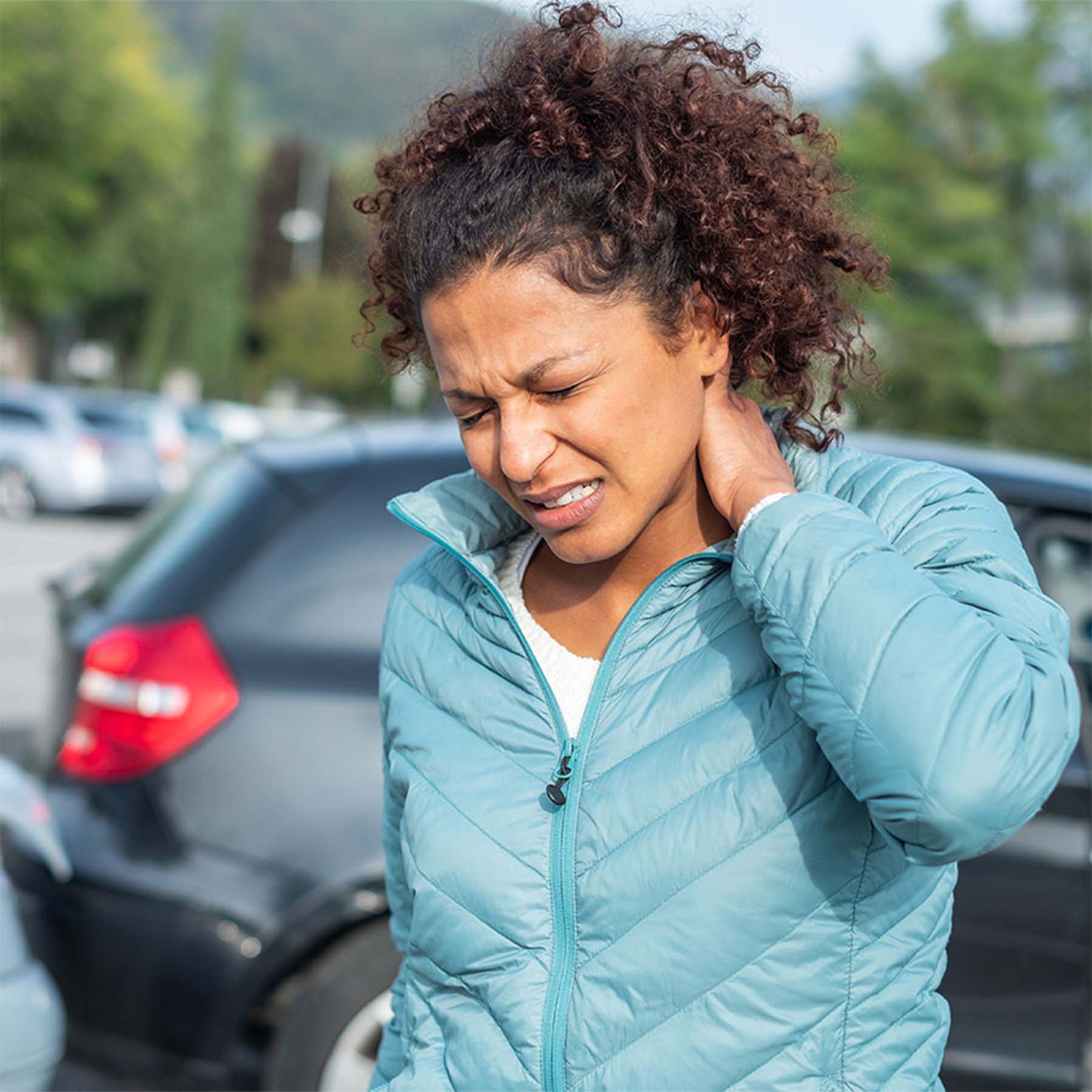Woman with neck pain after car accident